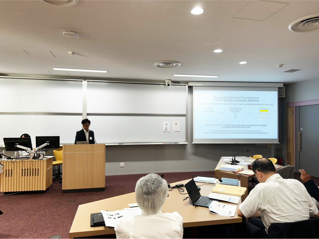 日本観光学会九州・沖縄支部支部大会の会場で発表する様子